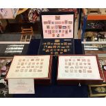 A cased set of gold plated silver stamps "Replicas of the Empire Collection" produced by Hallmark