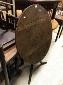 A Georgian oak circular tilt top tripod table together with a small pine corner cupboard