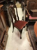 A set of eight early 20th Century mahogany dining chairs in the Queen Anne style (6 plus 2 near