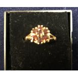 A 9 carat gold garnet cluster ring, approx 4.