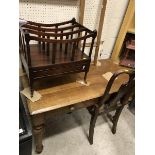 A Victorian mahogany Gothic Revival two drawer side table on studded and turned tapering legs,