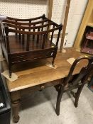 A Victorian mahogany Gothic Revival two drawer side table on studded and turned tapering legs,