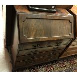 A mahogany bureau in the Georgian style