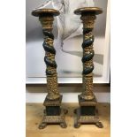 A pair of 16th Century carved giltwood and gesso and verdigris patinated candlesticks in the