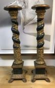 A pair of 16th Century carved giltwood and gesso and verdigris patinated candlesticks in the