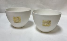 ANGELA MELLOR (Contemporary) - a pair of bone china bowls with impressed and gold leaf detail,