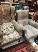 A circa 1900 upholstered wingback armchair together with a Victorian upholstered armchair