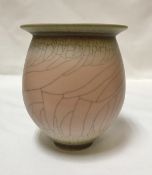 DAVID WHITE (1934-2011) - a porcelain wide-rimmed jar, pink / peach crackle glaze,