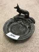 A modern French bronze dish with wolf decoration and verdigris patination