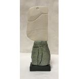 PETER HAYES (Born 1946) - a stoneware mounted porcelain blade on granite base,