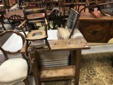 A vintage carpenter's bench with integral wooden vice and a child's vintage Oxford style commode