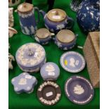 A Wedgwood blue Jasper dip three piece tea set, a similar jug with plated mounts,