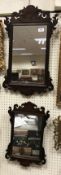 Two fretwork carved framed wall mirrors