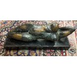 A verdigris patinated bronze study of a recumbent nude in the manner of Henry Moore apparently