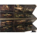 A 19th Century Continental painted four fold screen decorated in oils with twelve panels of figures