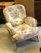 A pair of Ercol "Jubilee" beech framed open arm chairs circa 1985, designed by Don Pedal circa 1980,