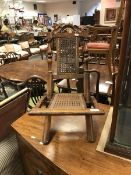 A Victorian child's walnut framed and caned folding chair