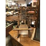 A Victorian child's walnut framed and caned folding chair