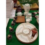 A Midwinter Stylecraft semi-porcelain coffee set, a Poole leaf pattern hors d'oeuvres set,
