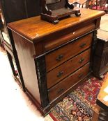 A Victorian mahogany Derbyshire chest with cushion drawer over three long drawers flanked by carved