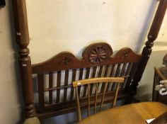 An Indian teak single four poster bedstead