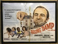 A collection of film posters to include "Rising Damp, the Movie",