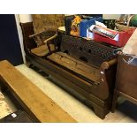 A Continental carved and stained pine bench seat and an elm smokers bow chair