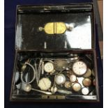 A tin containing various wrist and pocket watches to include 9 carat gold cased wristwatch,
