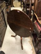 Two 19th Century oak snap top pedestal occasional tables and a 19th Century mahogany oval snap top