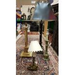 A pair of modern brass reeded column table lamps,