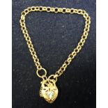 A 9 carat gold Belcher link bracelet set with stone set loveheart padlock,