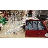 A collection of seven modern cut glass decanters together with a modern tantalus and various other