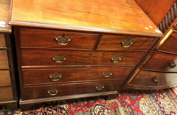 A 19th Century mahogany chest of two short over three long drawers on bracket feet