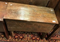 A 19th Century provincial oak hutch of small proportions on plank end supports