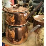 A Victorian copper steamer pan set in two sections with lid, bearing initials "C.W.