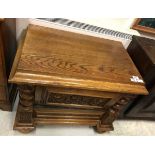 A circa 1900 Continental oak dwarf cupboard with fall-front compartment over a single drawer on