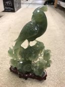 A modern Chinese carved jade figure of a phoenix