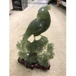 A modern Chinese carved jade figure of a phoenix