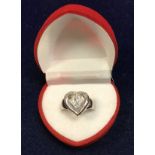 An 18 carat white gold dress ring set with diamonds in loveheart shape, approx 5.
