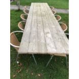 A modern slatted garden refectory style table