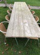 A modern slatted garden refectory style table