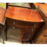 A 19th Century mahogany and inlaid commode chest of single deep drawer as two and further deep