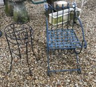 A wrought iron garden chair,