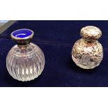 An Edwardian silver mounted hobnail cut grenade scent bottle with cherubic decoration (Birmingham