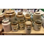 A collection of eleven various stoneware jars, including William Powell and Son pottery of Bristol,