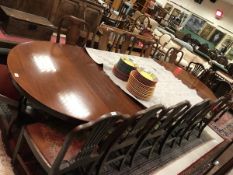 A Victorian mahogany D-end dining table with split centre pedestal pulling apart to allow for