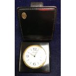 A Cartier travel clock with Swiss movement and French case No'd verso 012743HF,