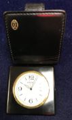 A Cartier travel clock with Swiss movement and French case No'd verso 012743HF,