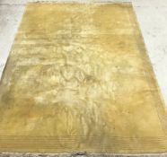 A Chinese superwash rug of plain yellow ground approx.