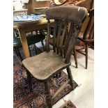 A set of five Victorian slat back kitchen chairs and a similar stick back chair